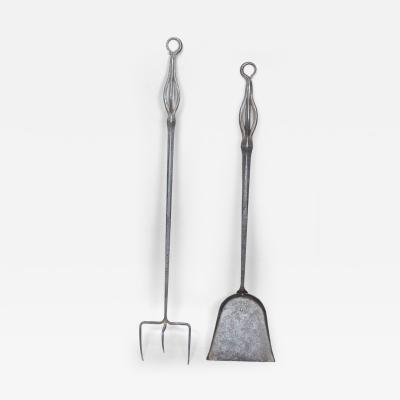 A Pair of Arts Crafts Steel Fire Utensils