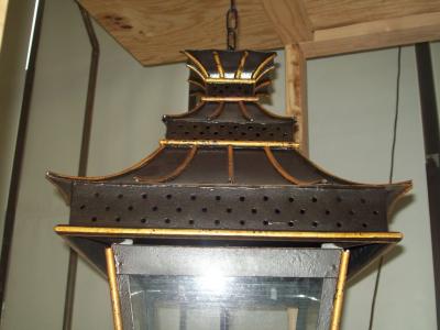 A Pair of Asian Inspired Tole Painted Lanterns