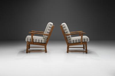 A Pair of Danish Oak Easy Chairs Denmark 1970s