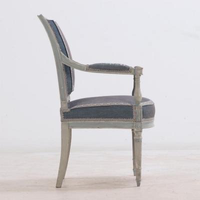 A Pair of French Directoire painted open armchairs C 1800 