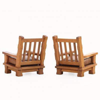 A Pair of French Heavy Oak Brutalist style Open Arm Chairs C 1960 