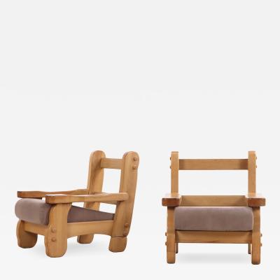 A Pair of French Heavy Oak Brutalist style Open Arm Chairs C 1960 