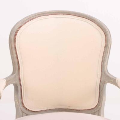 A Pair of French Louis XV style open arm chairs C 1920 