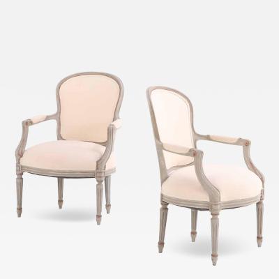 A Pair of French Louis XV style open arm chairs C 1920 