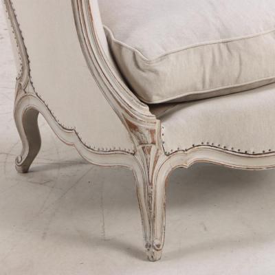 A Pair of French Louis XV style painted bergere chairs C 1920 