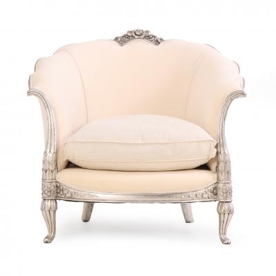 A Pair of French Louis XV style silver leaf lounge chairs C 1930 