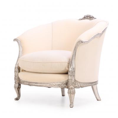 A Pair of French Louis XV style silver leaf lounge chairs C 1930 