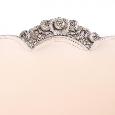 A Pair of French Louis XV style silver leaf lounge chairs C 1930 