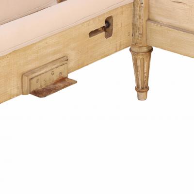 A Pair of French Louis XVI style Painted and Gilt Twin Beds C 1940 