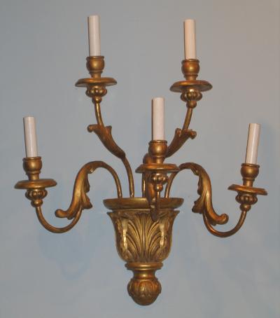 A Pair of Gilded Wood Sconces with Five Lights featuring acanthus leaves