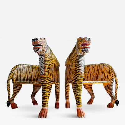 A Pair of Indian Polychrome Decorated Tiger Throne Chairs