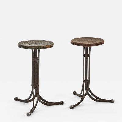 A Pair of Industrial Stools with Metal Base
