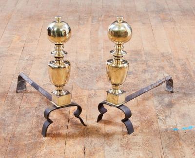 A Pair of Italian Baroque Brass and Iron Andirons