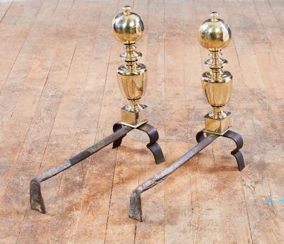 A Pair of Italian Baroque Brass and Iron Andirons