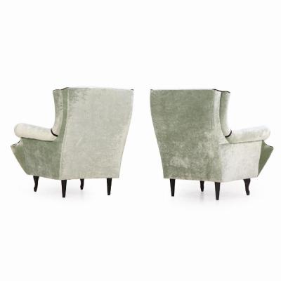 A Pair of Italian upholstered two tone lounge chairs C 1950 