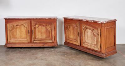 A Pair of Large Marble Top Buffets