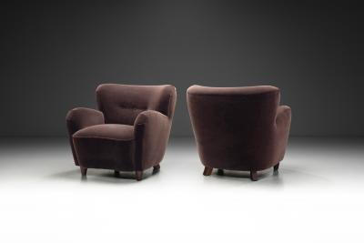 A Pair of Mid Century Armchairs With Stained Legs Europe Mid 20th Century
