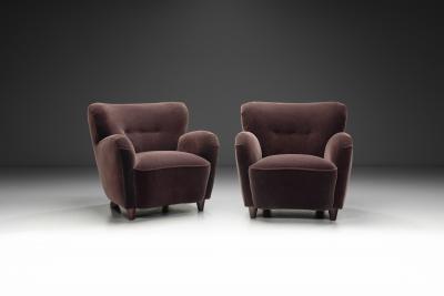 A Pair of Mid Century Armchairs With Stained Legs Europe Mid 20th Century