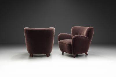 A Pair of Mid Century Armchairs With Stained Legs Europe Mid 20th Century