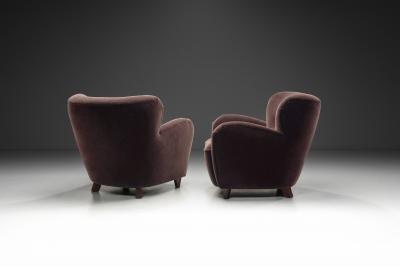 A Pair of Mid Century Armchairs With Stained Legs Europe Mid 20th Century