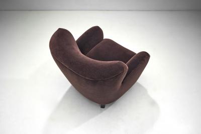 A Pair of Mid Century Armchairs With Stained Legs Europe Mid 20th Century