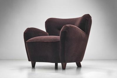 A Pair of Mid Century Armchairs With Stained Legs Europe Mid 20th Century