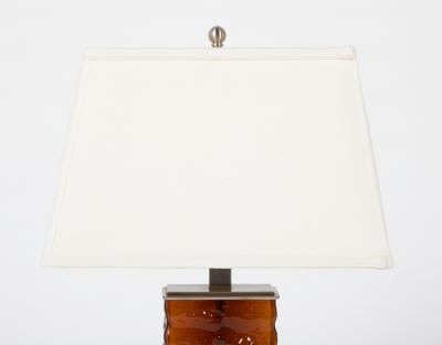 A Pair of Mid Century Wavy Amber Glass Steel Lamps