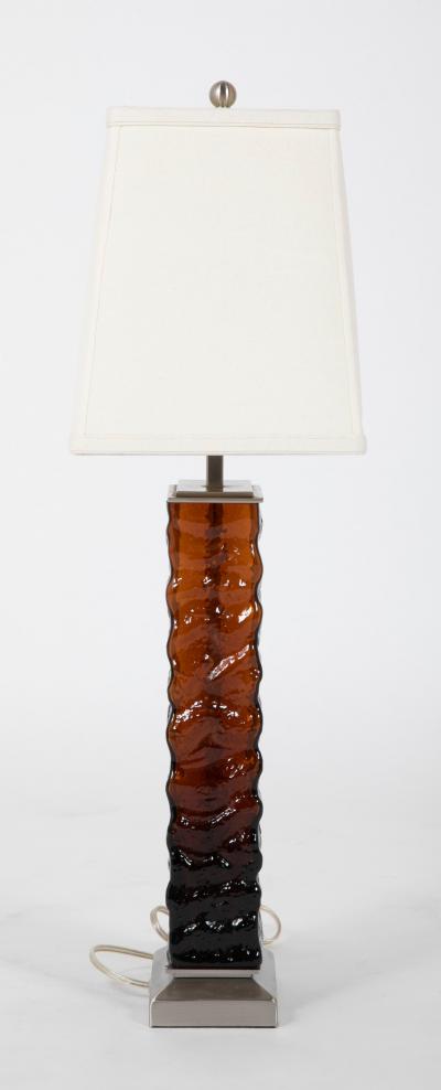 A Pair of Mid Century Wavy Amber Glass Steel Lamps
