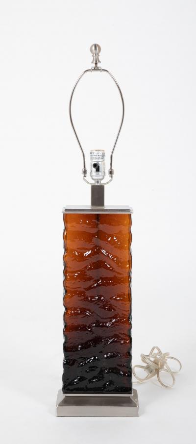 A Pair of Mid Century Wavy Amber Glass Steel Lamps