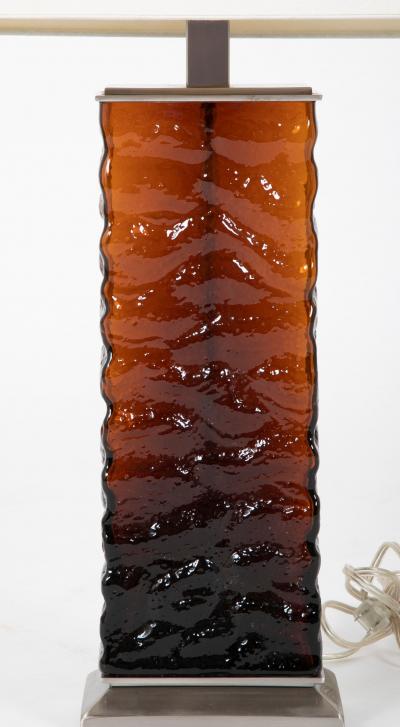 A Pair of Mid Century Wavy Amber Glass Steel Lamps