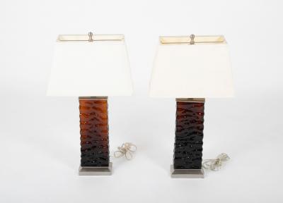 A Pair of Mid Century Wavy Amber Glass Steel Lamps