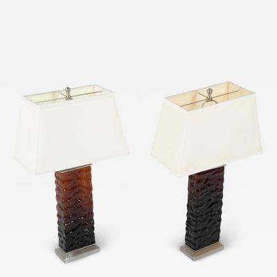A Pair of Mid Century Wavy Amber Glass Steel Lamps