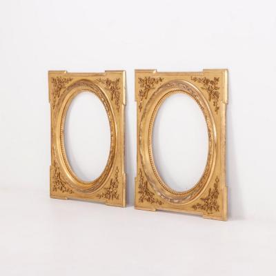 A Pair of Napoleon III style giltwood and gesso picture frames 19th C 