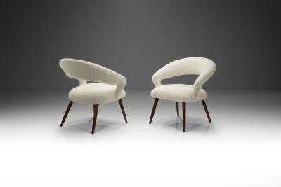 A Pair of Oak Cocktail Chairs Europe 1950s