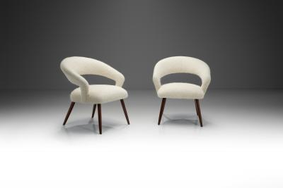 A Pair of Oak Cocktail Chairs Europe 1950s