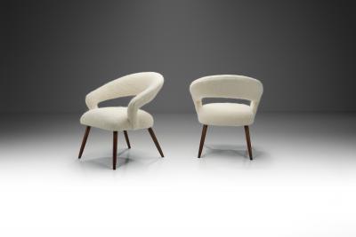 A Pair of Oak Cocktail Chairs Europe 1950s