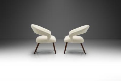 A Pair of Oak Cocktail Chairs Europe 1950s
