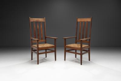 A Pair of Oak and Woven Rush High Back Armchairs France 1940s