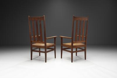 A Pair of Oak and Woven Rush High Back Armchairs France 1940s