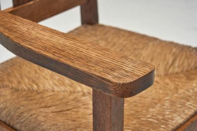 A Pair of Oak and Woven Rush High Back Armchairs France 1940s