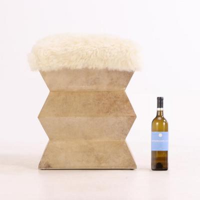 A Pair of Parchment Covered Stools of architectural form 