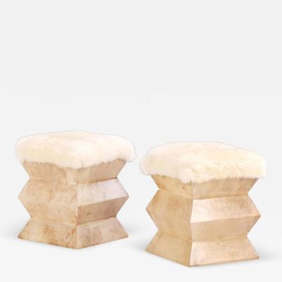 A Pair of Parchment Covered Stools of architectural form 
