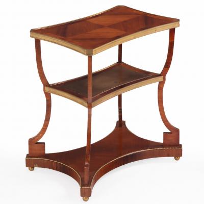 A Pair of Regency style Rosewood Leather Bronze Mounted Three Tier End Tables 