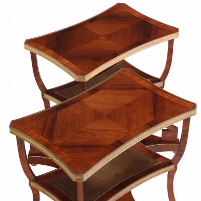 A Pair of Regency style Rosewood Leather Bronze Mounted Three Tier End Tables 