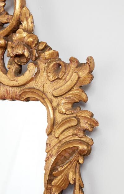 A Pair of Rococo Giltwood Mirrors