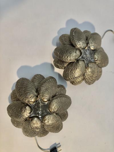 A Pair of Silver Plated Bronze Mol ne Sconces by Claudio Gonzalez 2012