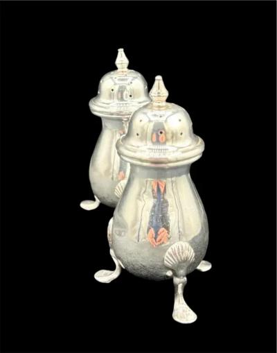 A Pair of Sterling Silver Salt Pepper Shakers