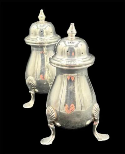 A Pair of Sterling Silver Salt Pepper Shakers