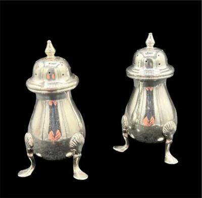 A Pair of Sterling Silver Salt Pepper Shakers
