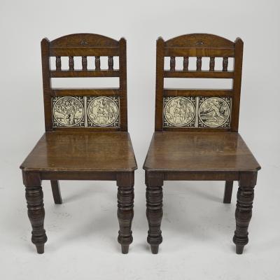 A Pair of Substantial Gothic Revival Oak Hall Chairs with Period Tiles